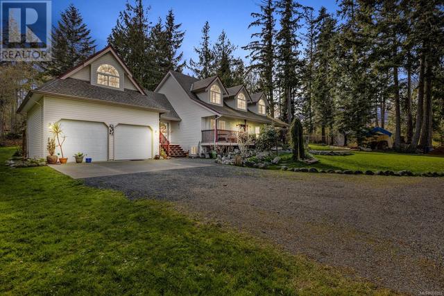 6249 Island Hwy, House detached with 3 bedrooms, 3 bathrooms and 8 parking in Comox Valley A BC | Image 1