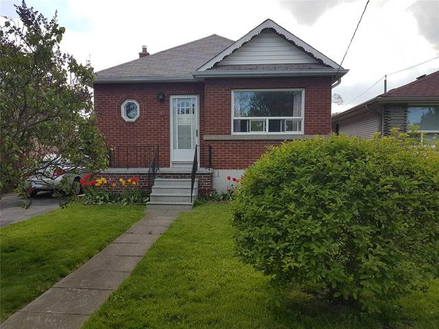 18 Wesley St, House detached with 2 bedrooms, 2 bathrooms and 4 parking in Toronto ON | Image 1