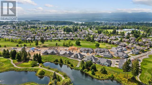 141 - 1444 Crown Isle Dr, House attached with 2 bedrooms, 2 bathrooms and 6 parking in Courtenay BC | Image 11