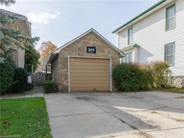 309 Broadway Street, House detached with 6 bedrooms, 3 bathrooms and 9 parking in Tillsonburg ON | Image 2