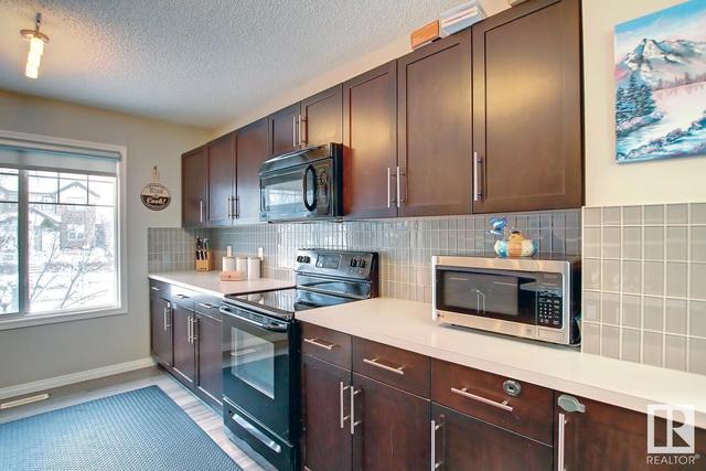 486 Hemingway Rd Nw, House attached with 2 bedrooms, 2 bathrooms and null parking in Edmonton AB | Card Image