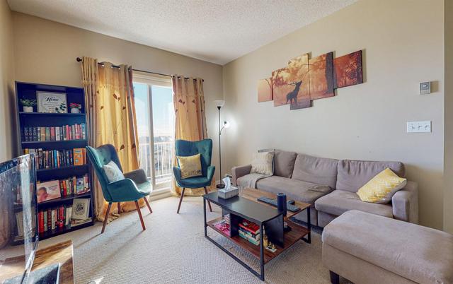2412 - 1140 Taradale Drive Ne, Condo with 2 bedrooms, 2 bathrooms and 1 parking in Calgary AB | Image 2