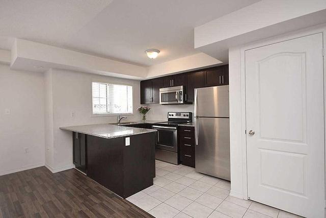 9 - 2492 Post Rd, Townhouse with 2 bedrooms, 2 bathrooms and 1 parking in Oakville ON | Image 6