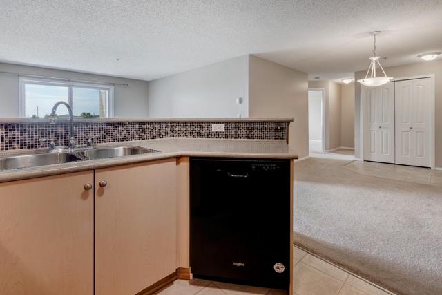 7204 - 304 Mackenzie Way Sw, Condo with 2 bedrooms, 1 bathrooms and 1 parking in Calgary AB | Image 6