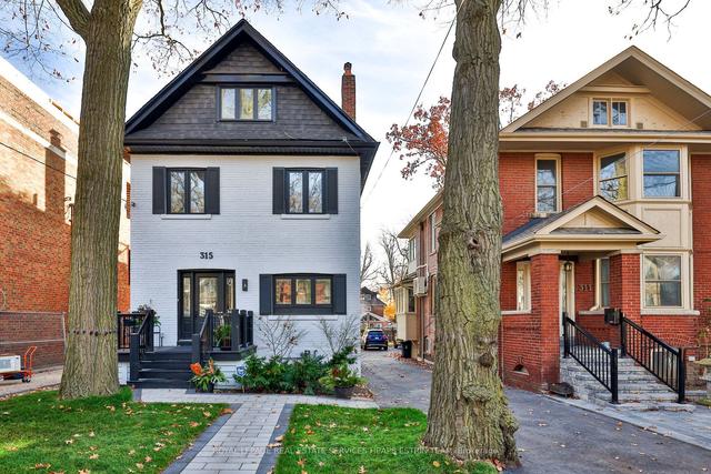 315 St Clair Ave E, House detached with 4 bedrooms, 3 bathrooms and 2 parking in Toronto ON | Image 1