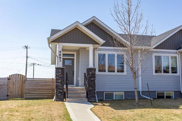 5693 45 Avenue, Home with 3 bedrooms, 2 bathrooms and 2 parking in Lacombe AB | Image 1