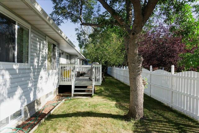 20 Lincoln Manor Sw, Home with 3 bedrooms, 2 bathrooms and 2 parking in Calgary AB | Image 19