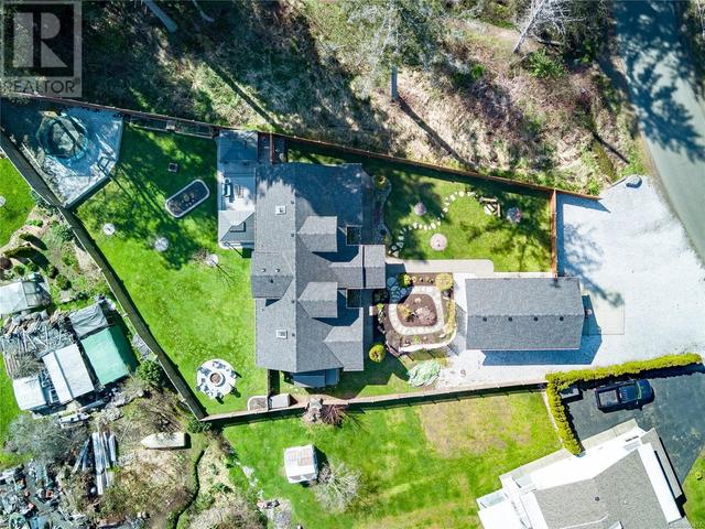269 Spindrift Rd, House detached with 4 bedrooms, 3 bathrooms and 6 parking in Comox Valley A BC | Image 58