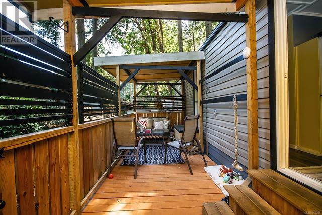 Lovely cedar patio deck off kitchen. | Image 2