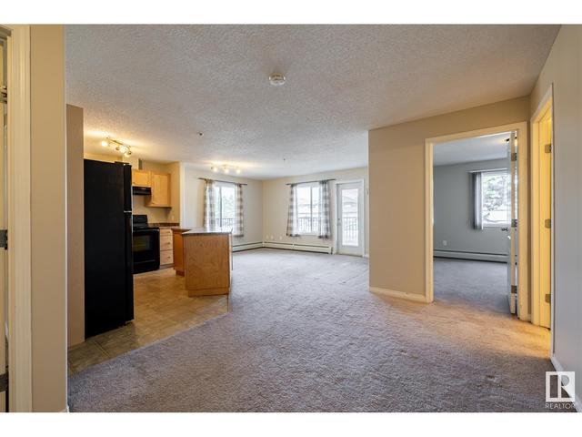 104 - 111 Edwards Dr Sw, Condo with 2 bedrooms, 2 bathrooms and null parking in Edmonton AB | Image 1