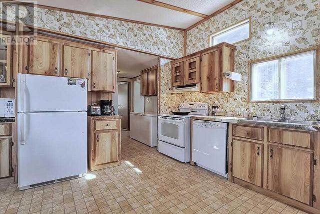 33122 Range Road 50, House other with 4 bedrooms, 2 bathrooms and null parking in Mountain View County AB | Image 18