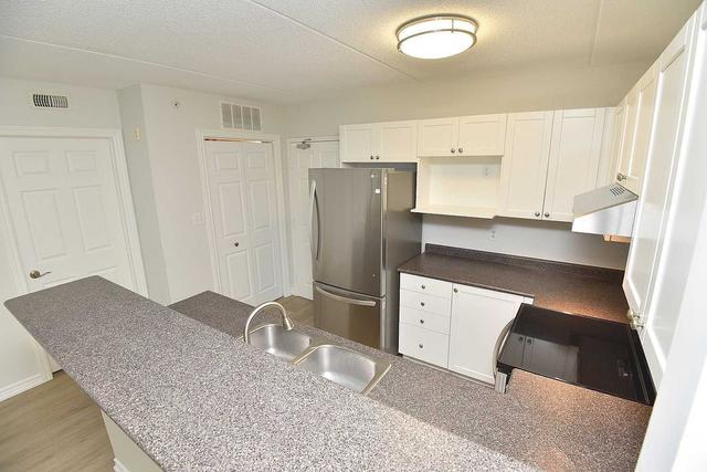 209 - 2075 Appleby Line, Condo with 2 bedrooms, 1 bathrooms and 1 parking in Burlington ON | Image 7