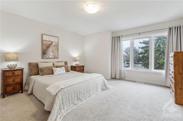 21 Milner Downs Crescent, Townhouse with 3 bedrooms, 3 bathrooms and 3 parking in Ottawa ON | Image 15