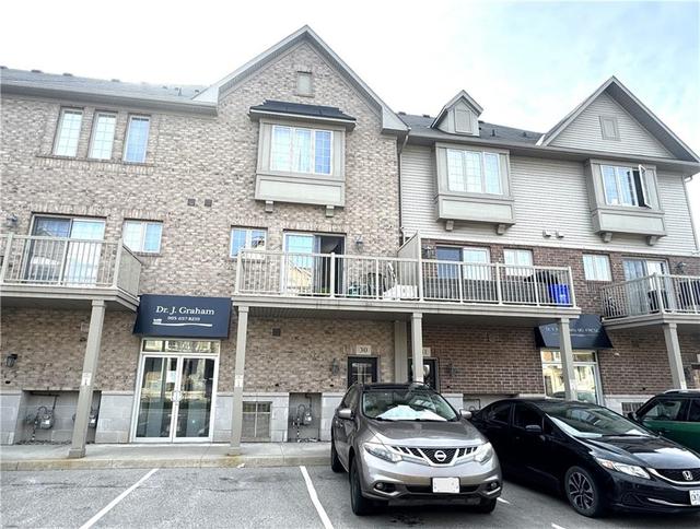 30 - 1401 Plains Road E, Condo with 2 bedrooms, 2 bathrooms and 1 parking in Burlington ON | Image 1