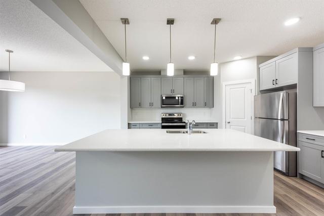 105 Belmont Villas Sw, House detached with 3 bedrooms, 2 bathrooms and 4 parking in Calgary AB | Image 13