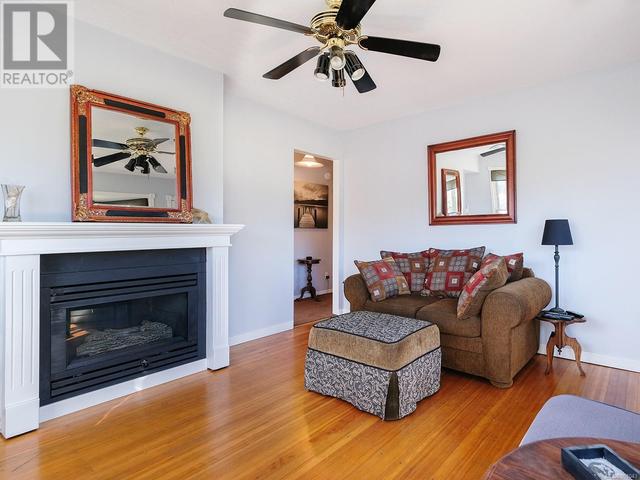 Living room with natural gas fireplace | Image 2