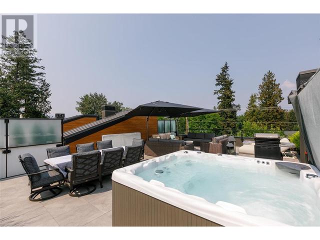 11 - 525 Mcclure Road, House attached with 4 bedrooms, 2 bathrooms and 4 parking in Kelowna BC | Image 2