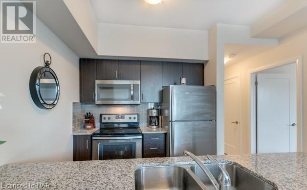 207 - 10 Concord Place, Condo with 1 bedrooms, 1 bathrooms and 1 parking in Grimsby ON | Image 5