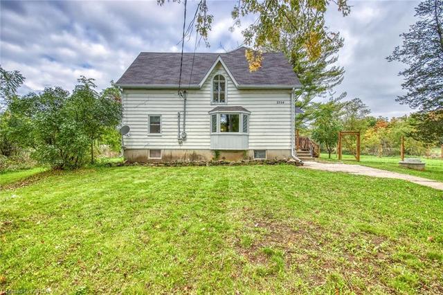 2354 Harlem Road, House detached with 6 bedrooms, 2 bathrooms and 12 parking in Rideau Lakes ON | Image 2