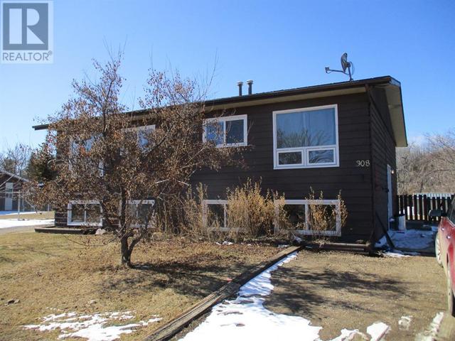 308 2nd Street, House semidetached with 4 bedrooms, 2 bathrooms and 2 parking in Manning AB | Card Image