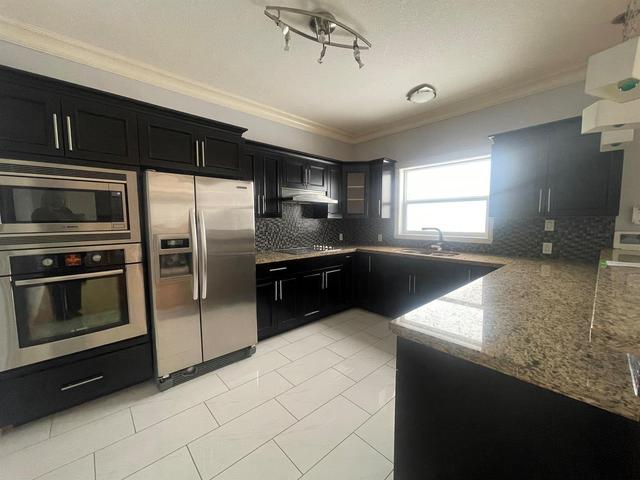 219 Woodpecker Way, House detached with 5 bedrooms, 3 bathrooms and 2 parking in Wood Buffalo AB | Image 3