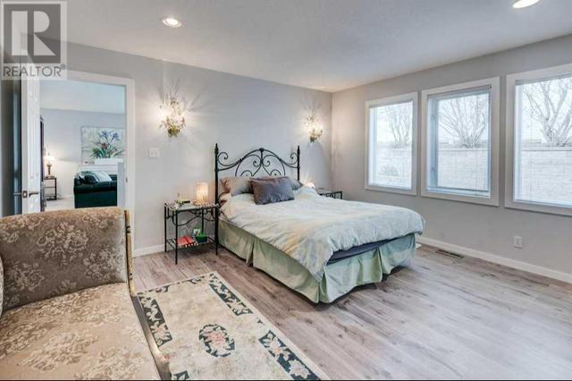 HUGE Primary Bedroom has plenty of room for your King Size bed | Image 16