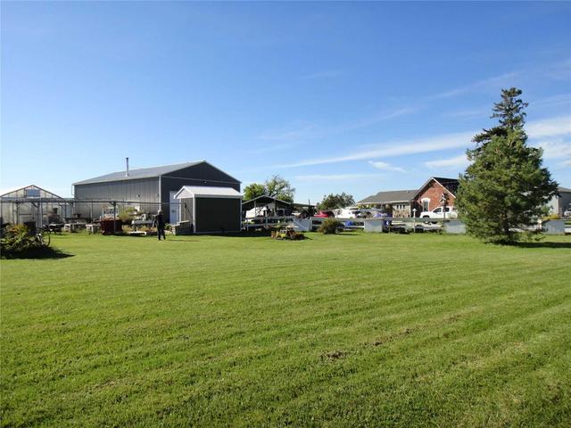 27989 Highway 48 Rd, House detached with 2 bedrooms, 1 bathrooms and 30 parking in Georgina ON | Image 3