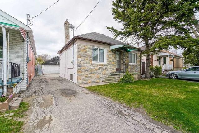 135 Evans Ave, House detached with 2 bedrooms, 2 bathrooms and 5 parking in Toronto ON | Image 1