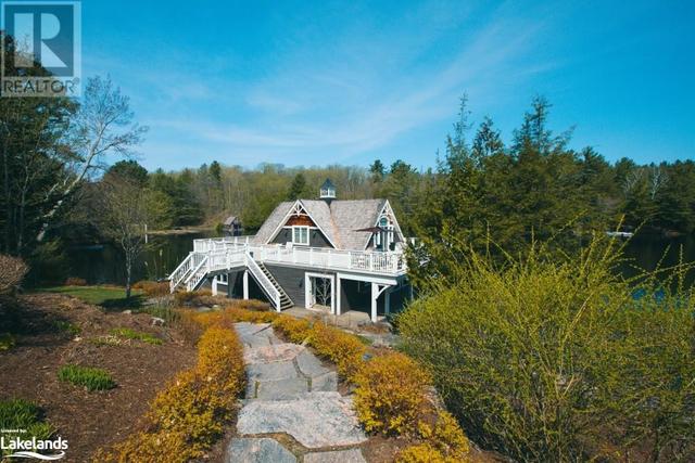 1027 Chown Road, House detached with 3 bedrooms, 2 bathrooms and 9 parking in Muskoka Lakes ON | Image 4
