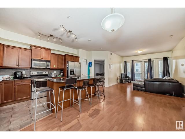 101 - 1406 Hodgson Wy Nw, Condo with 2 bedrooms, 2 bathrooms and 2 parking in Edmonton AB | Image 2