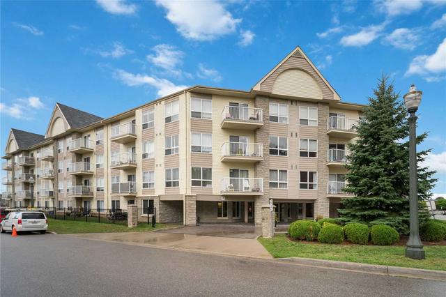 201 - 8 Harris St, Condo with 2 bedrooms, 2 bathrooms and 1 parking in Cambridge ON | Image 1