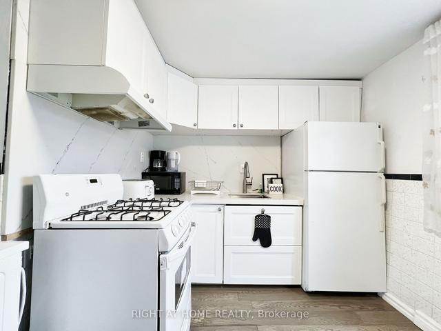 28 Fennings St, House attached with 3 bedrooms, 3 bathrooms and 2.5 parking in Toronto ON | Image 28
