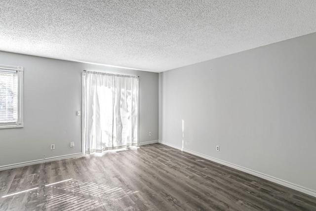 502 - 340 Falconridge Crescent Ne, Home with 3 bedrooms, 1 bathrooms and 1 parking in Calgary AB | Image 2