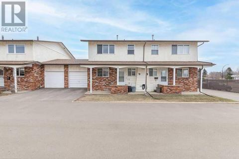 2, - 3018 56 Avenue, House attached with 3 bedrooms, 1 bathrooms and 2 parking in Lloydminster (Part) AB | Card Image