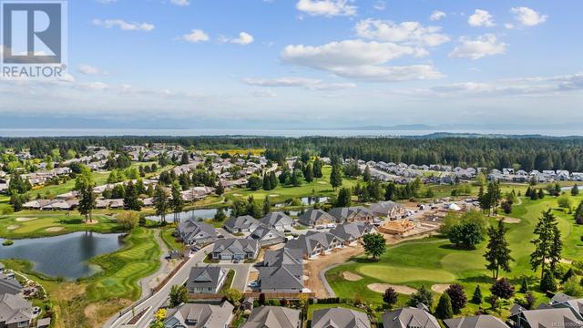 141 - 1444 Crown Isle Dr, House attached with 2 bedrooms, 2 bathrooms and 6 parking in Courtenay BC | Image 15