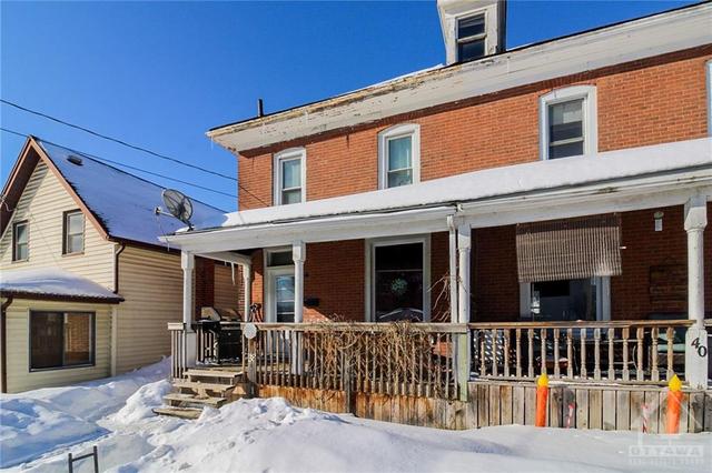 38 Pearl Street E, Home with 4 bedrooms, 2 bathrooms and 2 parking in Brockville ON | Image 1