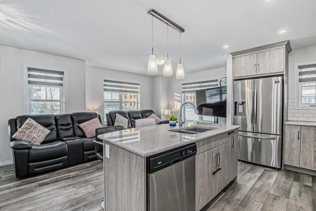 268 Carrington Way Nw, Home with 3 bedrooms, 2 bathrooms and 2 parking in Calgary AB | Image 8