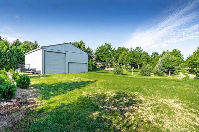 125 County Rd 14, House detached with 2 bedrooms, 4 bathrooms and 9 parking in Leamington ON | Image 30