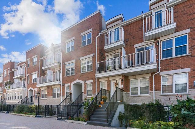 2 - 37 Four Winds Dr, Townhouse with 2 bedrooms, 2 bathrooms and 1 parking in Toronto ON | Image 1