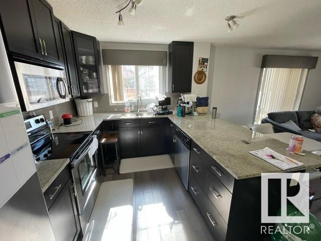 117 - 2204 44 Av Nw, Condo with 2 bedrooms, 2 bathrooms and 1 parking in Edmonton AB | Image 5