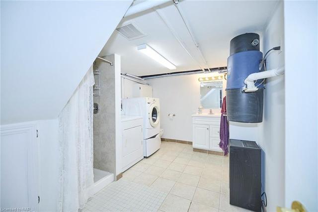 Unit #1 Bathroom w/laundry | Image 20