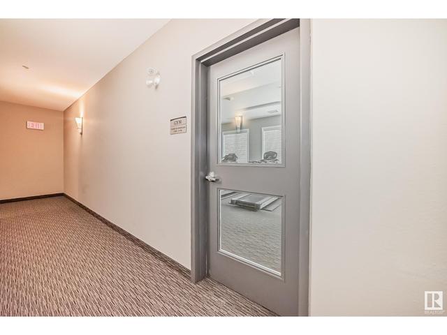 310 - 6083 Maynard Wy Nw, Condo with 1 bedrooms, 1 bathrooms and 2 parking in Edmonton AB | Image 34