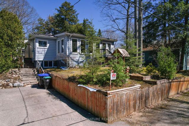77 Oliver Dr E, House detached with 2 bedrooms, 1 bathrooms and 4 parking in Tiny ON | Image 1