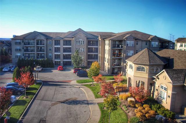 411 - 1380 Main St E, Condo with 3 bedrooms, 2 bathrooms and 3 parking in Milton ON | Image 1
