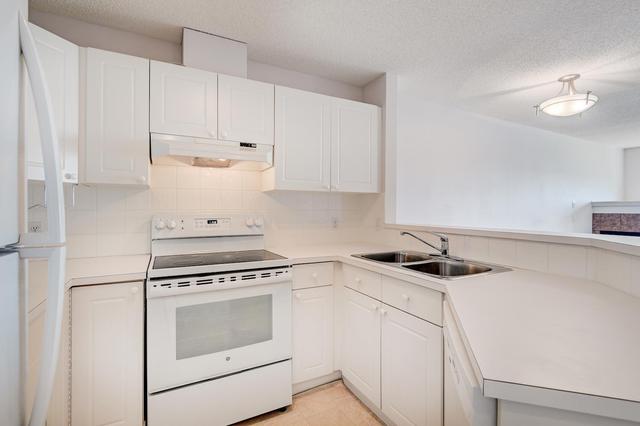 1304 - 950 Arbour Lake Road Nw, Condo with 2 bedrooms, 2 bathrooms and 1 parking in Calgary AB | Image 8
