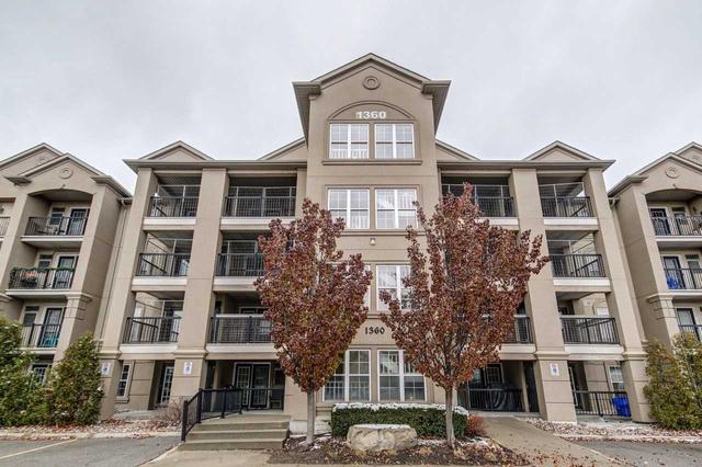 103 - 1360 Main St E, Townhouse with 1 bedrooms, 1 bathrooms and 2 parking in Milton ON | Image 1