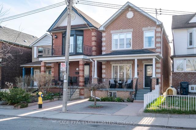 710 Brock Ave, House detached with 3 bedrooms, 3 bathrooms and 2 parking in Toronto ON | Image 1