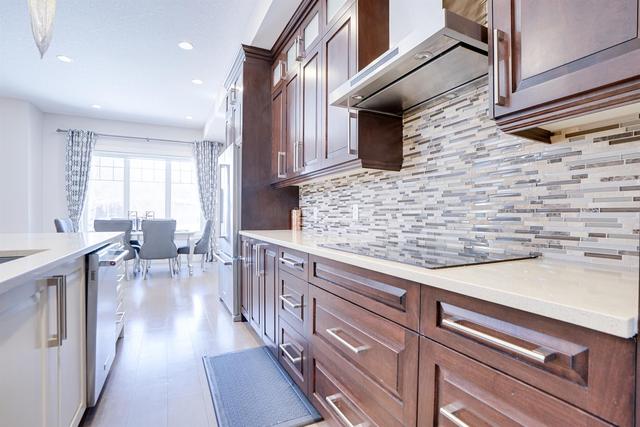 1235 Rosehill Drive Nw, Home with 4 bedrooms, 3 bathrooms and 2 parking in Calgary AB | Image 11
