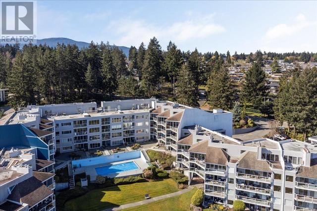 419 - 2562 Departure Bay Rd, Condo with 2 bedrooms, 2 bathrooms and 1 parking in Nanaimo BC | Image 2