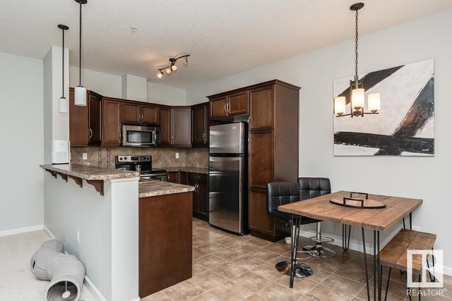 103 - 6083 Maynard Wy Nw, Condo with 1 bedrooms, 1 bathrooms and 1 parking in Edmonton AB | Image 13